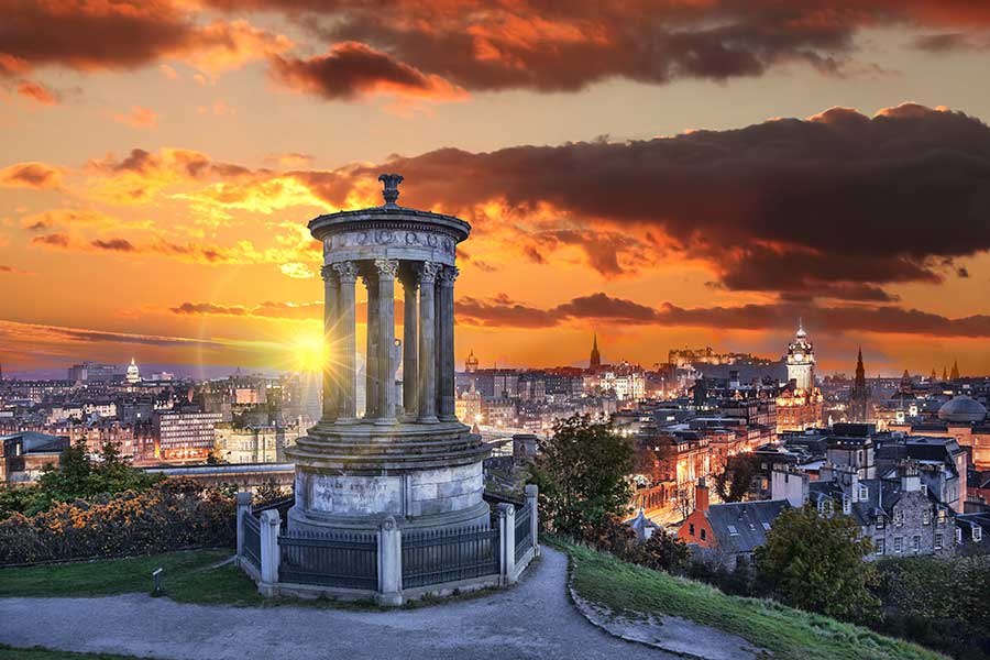 Edinburgh-against-sunset-with-Calton-Hill-